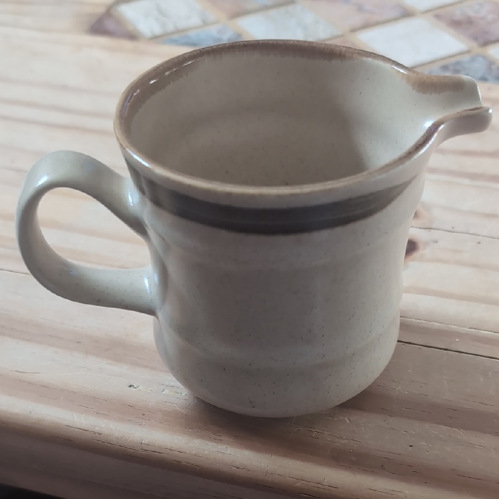 Cream and Brown Ceramic Pitcher